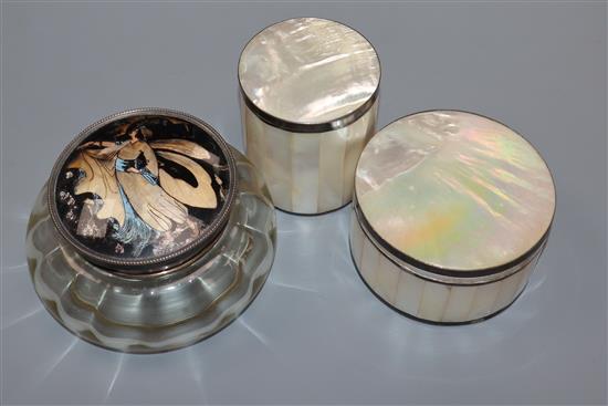 A silver, enamel and butterfly wing lidded powder bowl and two plated mounted mother opearl boxes.